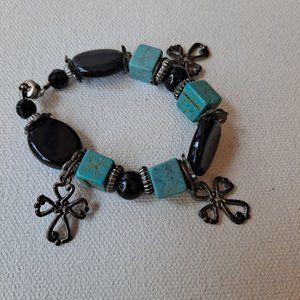 A small Black Jet and Turquoise Coptic Cross bracelet